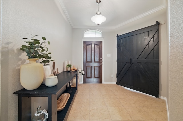 13165 Red Robin Dr, Fort Worth, TX 76244 - tiled foyer entrance with ornamental molding, baseboards, and a barn door