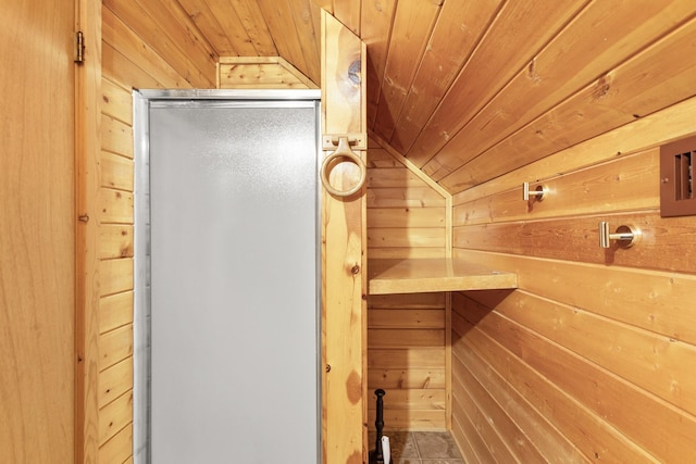 201 Cemetery Rd, Boyd, TX 76023 - relaxing sauna / steam room featuring wooden ceiling, wood walls, and tile patterned floors