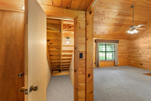 201 Cemetery Rd, Boyd, TX 76023 - corridor featuring carpet floors, wood ceiling, wooden walls, and lofted ceiling