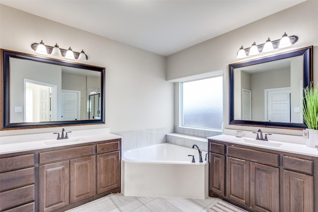 6829 Fire Dance Dr, Benbrook, TX 76126 - full bath with a garden tub and two vanities
