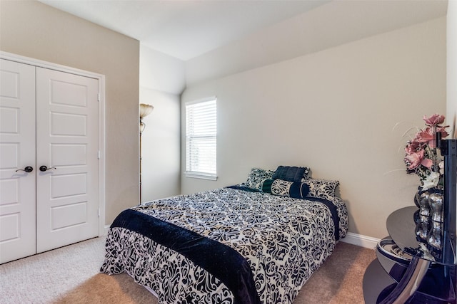 6829 Fire Dance Dr, Benbrook, TX 76126 - bedroom with carpet flooring, a closet, lofted ceiling, and baseboards