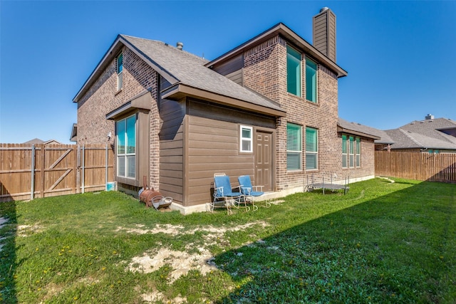 6829 Fire Dance Dr, Benbrook, TX 76126 - back of house featuring a chimney, brick siding, and roof with shingles