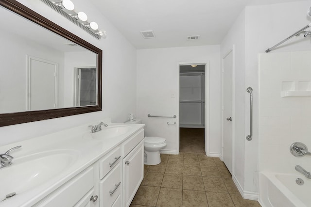6021 Lucas Ct, Fort Worth, TX 76119 - bathroom with toilet, tile patterned flooring, shower / bathtub combination, and double vanity