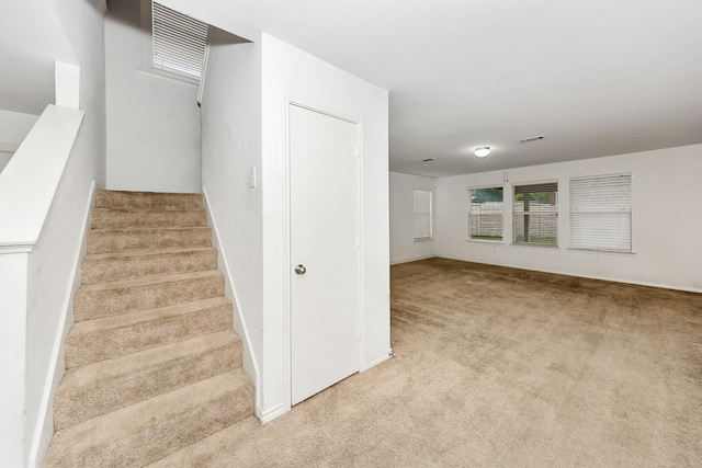 6021 Lucas Ct, Fort Worth, TX 76119 - stairs with carpet flooring and baseboards