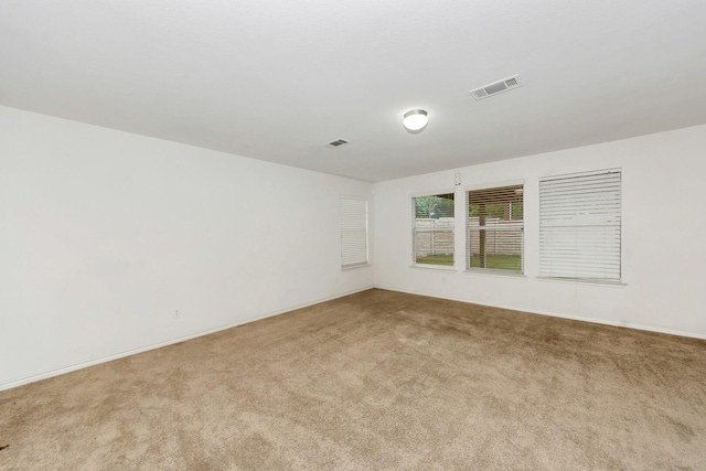 6021 Lucas Ct, Fort Worth, TX 76119 - empty room featuring carpet flooring and baseboards