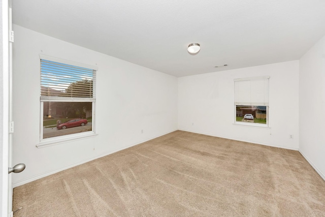 6021 Lucas Ct, Fort Worth, TX 76119 - carpeted empty room with baseboards