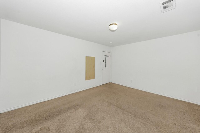 6021 Lucas Ct, Fort Worth, TX 76119 - unfurnished room with light carpet and baseboards