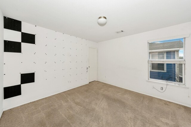 6021 Lucas Ct, Fort Worth, TX 76119 - unfurnished room with light carpet and baseboards
