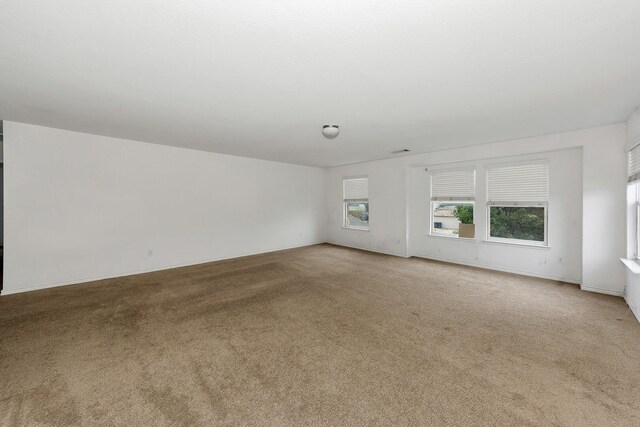 6021 Lucas Ct, Fort Worth, TX 76119 - carpeted empty room with baseboards