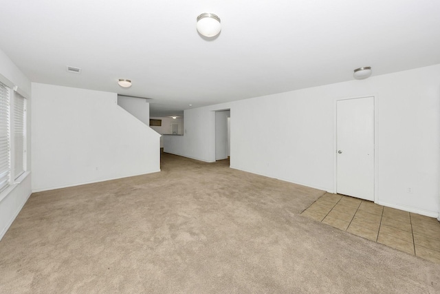 6021 Lucas Ct, Fort Worth, TX 76119 - unfurnished room featuring carpet flooring and stairs
