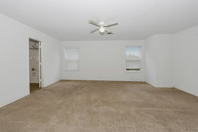 6021 Lucas Ct, Fort Worth, TX 76119 - spare room with light colored carpet, ceiling fan, and baseboards