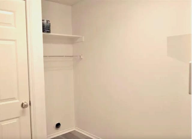 4600 Parkview Ln, Fort Worth, TX 76137 - laundry room with electric dryer hookup, dark wood-style flooring, and baseboards