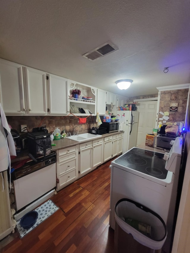 4601 County Road 3416, Lone Oak, TX 75453 - kitchen featuring range with electric stovetop, freestanding refrigerator, dark wood-type flooring, white cabinets, and a sink