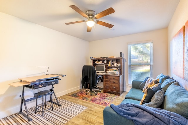 1505 Williamsburg Ct, Ennis, TX 75119 - office space with a ceiling fan, light wood-style flooring, and baseboards