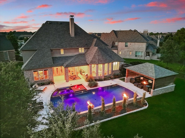 1000 Hazel Dr, Lantana, TX 76226 - view of pool with a yard, a pool with connected hot tub, and a patio