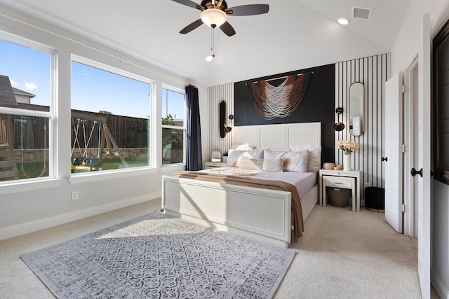 3925 Fairmount Ct, Sachse, TX 75048 - carpeted bedroom with lofted ceiling, multiple windows, baseboards, and a ceiling fan