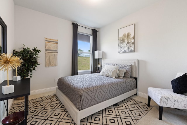 3925 Fairmount Ct, Sachse, TX 75048 - bedroom featuring light carpet and baseboards