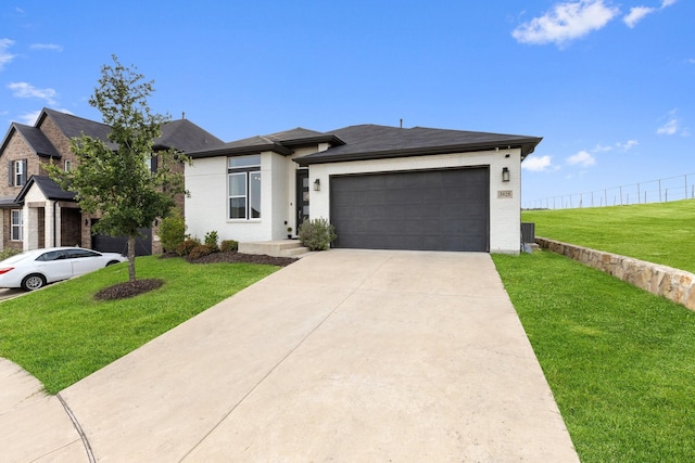 3925 Fairmount Ct, Sachse, TX 75048 - view of front of property with an attached garage, driveway, and brick siding