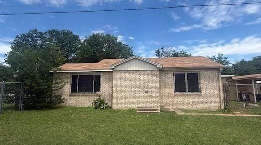 1302 Main St, Waco, TX 76704 - view of front of property featuring a front yard and brick siding