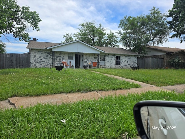3100 Manchester Dr, Mesquite, TX 75150 - view of front of home with brick siding and a shingled roof