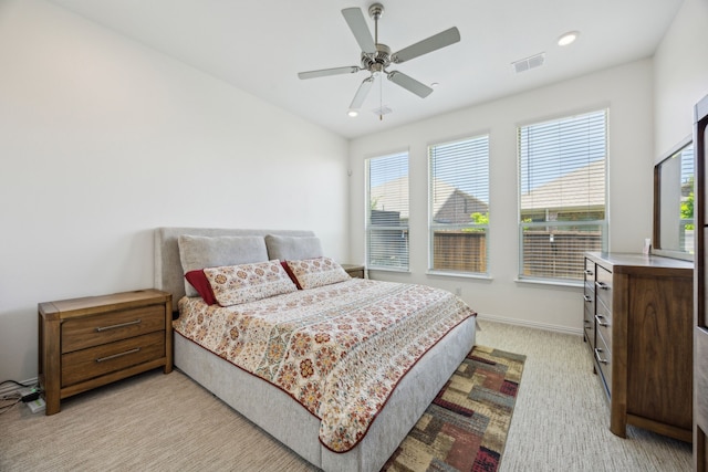 2004 Creekridge Dr, Lewisville, TX 75010 - bedroom featuring multiple windows, light carpet, baseboards, ceiling fan, and recessed lighting