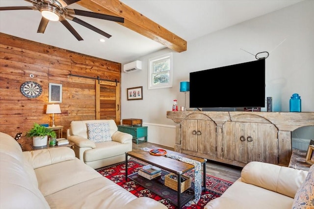 3227 Macarthur Dr, Waco, TX 76708 - living room with a barn door, ceiling fan, beamed ceiling, a wall unit AC, and wooden walls