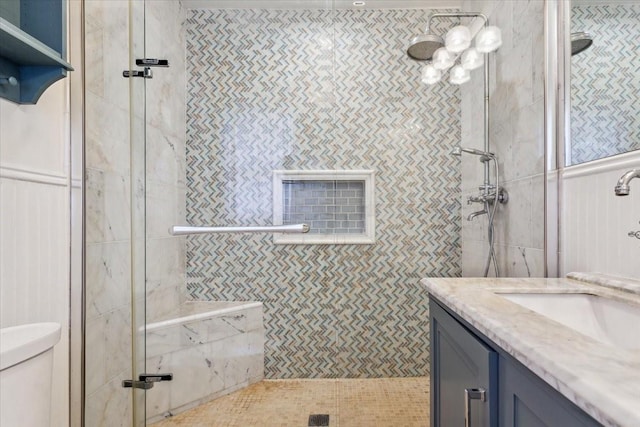 3227 Macarthur Dr, Waco, TX 76708 - bathroom featuring a tile shower, vanity, and toilet