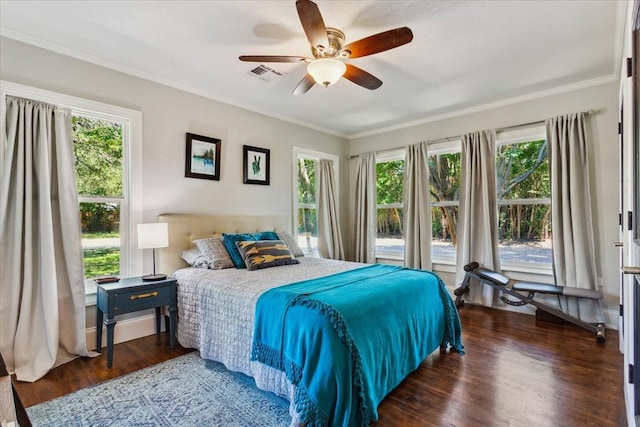 3227 Macarthur Dr, Waco, TX 76708 - bedroom with wood finished floors, crown molding, and ceiling fan