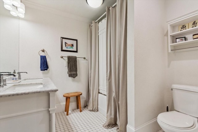 3227 Macarthur Dr, Waco, TX 76708 - full bath with toilet, tile patterned floors, shower / bath combination with curtain, crown molding, and vanity