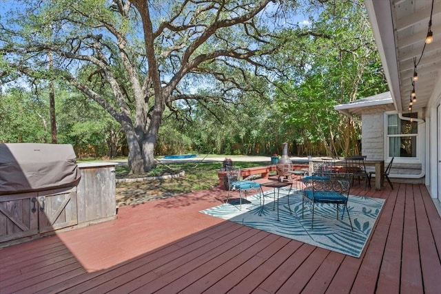 3227 Macarthur Dr, Waco, TX 76708 - wooden deck with outdoor dining area
