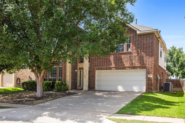 3737 Monica Ln, Fort Worth, TX 76244 - view of front of home with brick siding, a garage, driveway, and central AC unit