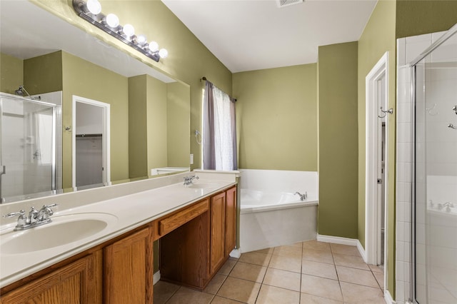 3737 Monica Ln, Fort Worth, TX 76244 - full bathroom featuring a stall shower, double vanity, a bath, tile patterned floors, and a spacious closet