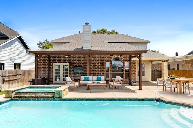 3737 Monica Ln, Fort Worth, TX 76244 - view of pool featuring french doors, a patio area, a pool with connected hot tub, and outdoor lounge area