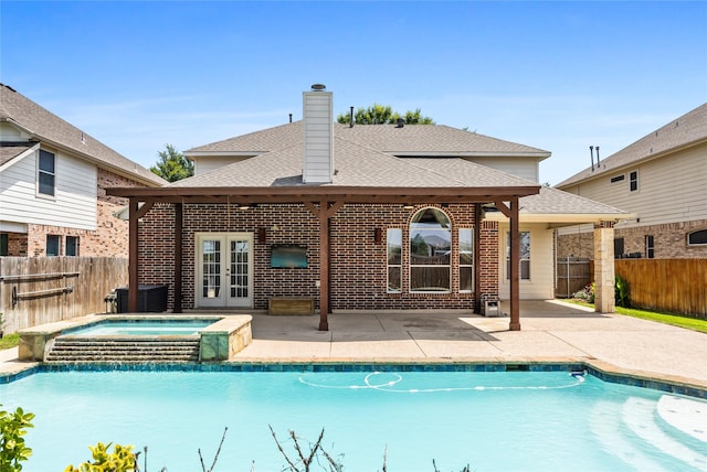 3737 Monica Ln, Fort Worth, TX 76244 - view of pool featuring french doors, a patio, and a pool with connected hot tub