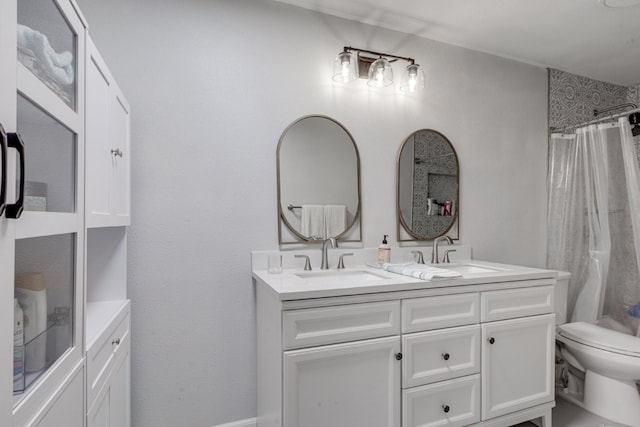 3510 Knoll Point Dr, Garland, TX 75043 - bathroom featuring double vanity, toilet, and a shower with curtain