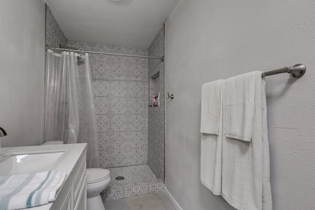 3510 Knoll Point Dr, Garland, TX 75043 - full bathroom with a tile shower, toilet, and vanity