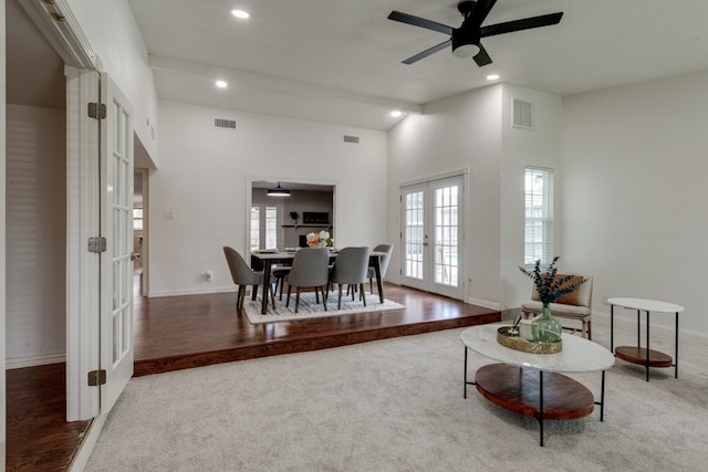 3510 Knoll Point Dr, Garland, TX 75043 - carpeted living room featuring french doors, recessed lighting, ceiling fan, baseboards, and a towering ceiling