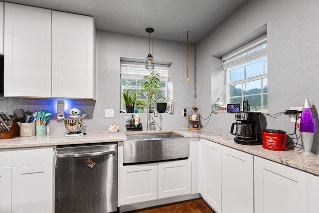 14293 S Fm 372, Valley View, TX 76272 - kitchen featuring dishwasher, a sink, white cabinetry, pendant lighting, and a textured ceiling