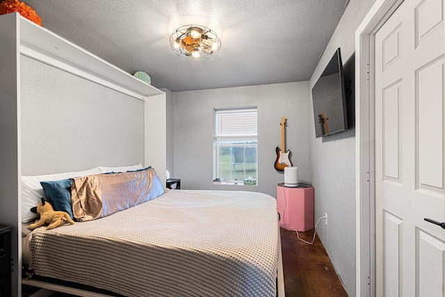 14293 S Fm 372, Valley View, TX 76272 - bedroom with concrete flooring and a textured ceiling
