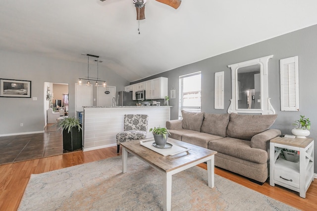 717 Kim Ln, Royse City, TX 75189 - living area featuring lofted ceiling, ceiling fan, and light wood finished floors