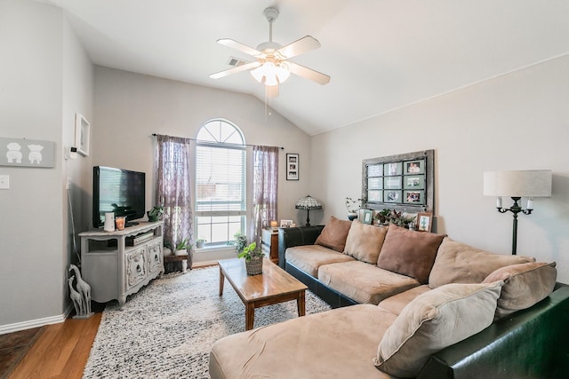 717 Kim Ln, Royse City, TX 75189 - living area featuring vaulted ceiling, wood finished floors, a ceiling fan, and baseboards