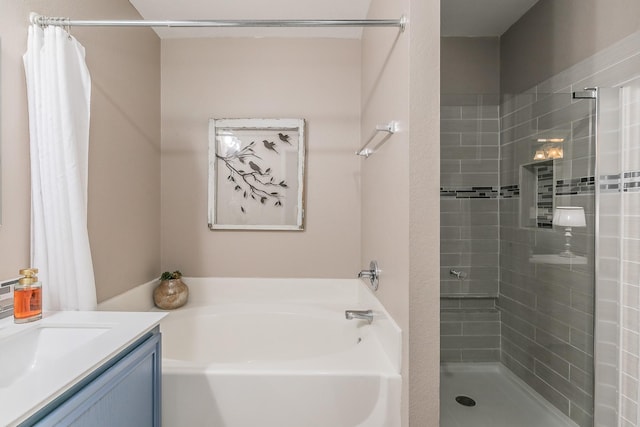 717 Kim Ln, Royse City, TX 75189 - full bathroom with a garden tub, a shower stall, and vanity