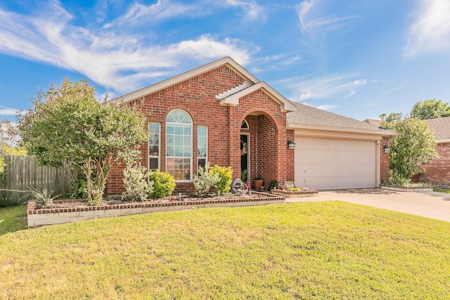 717 Kim Ln, Royse City, TX 75189 - view of front of property featuring brick siding, driveway, and a garage