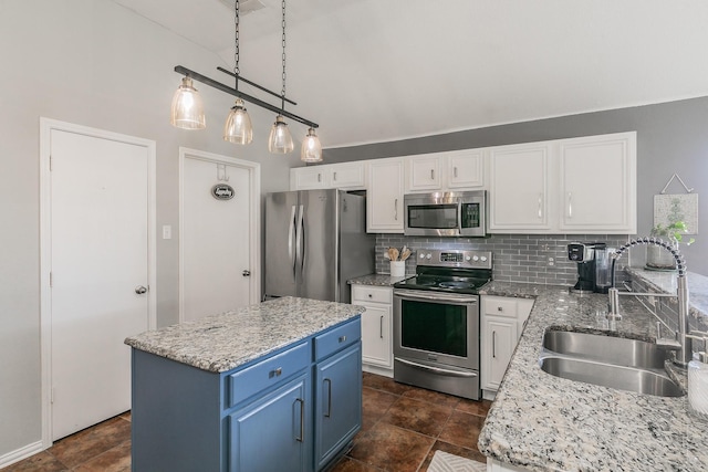 717 Kim Ln, Royse City, TX 75189 - kitchen featuring stainless steel appliances, a sink, white cabinets, blue cabinets, and tasteful backsplash