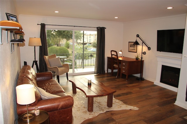 4320 Holland Ave Unit 202, Dallas, TX 75219 - living area featuring crown molding, wood finished floors, a fireplace, recessed lighting, and baseboards