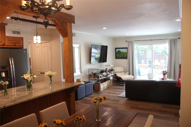 4320 Holland Ave Unit 202, Dallas, TX 75219 - living room with dark wood-style flooring, crown molding, and recessed lighting