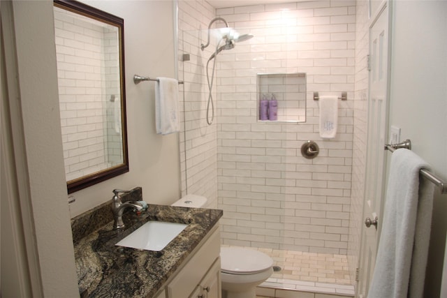 4320 Holland Ave Unit 202, Dallas, TX 75219 - bathroom with toilet, a stall shower, and vanity
