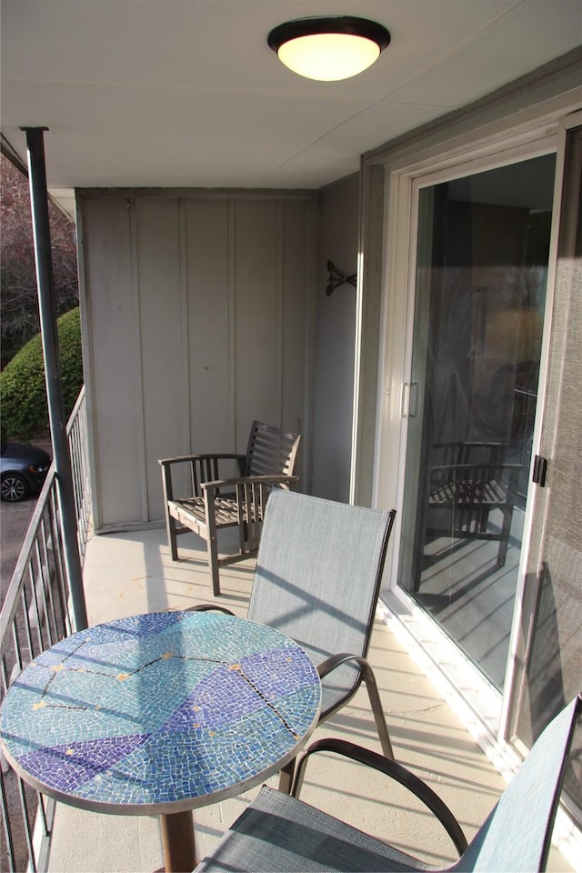 4320 Holland Ave Unit 202, Dallas, TX 75219 - balcony featuring outdoor dining area