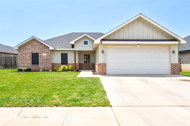 7010 Jet Stream Dr, Abilene, TX 79606 - view of front of home featuring brick siding, driveway, board and batten siding, a garage, and roof with shingles