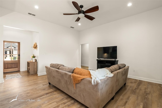 7010 Jet Stream Dr, Abilene, TX 79606 - living area featuring a ceiling fan, wood finished floors, baseboards, and recessed lighting